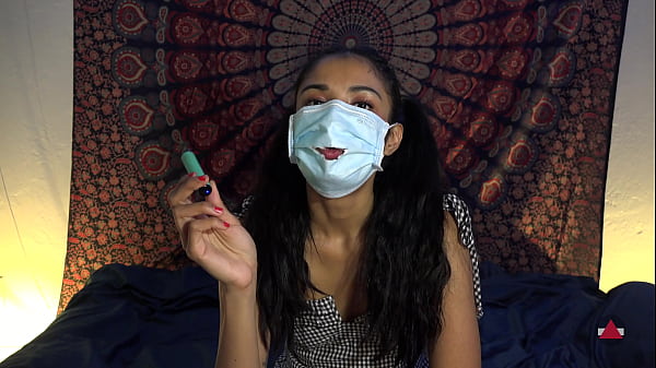 She took off her mask to lick cock